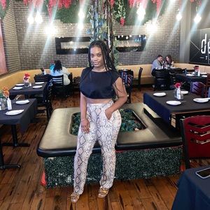 Women snake print trousers